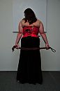 met men rood corsetje, foto 2656x4000, 6 reacties, 35 stemmen