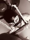 Latex hood, foto 640x850, 14 reacties, 59 stemmen