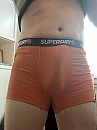 Hard in mijn oranje boxershort, foto 2320x3088, 0 reacties, 2 stemmen